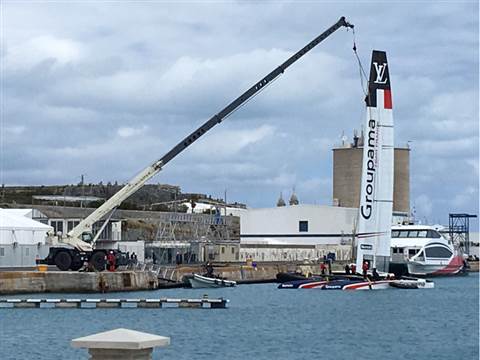 Team FranceÃ¢â‚¬â„¢s yacht being lowered into the water for the AmericaÃ¢â‚¬â„¢s Cup in Bermuda using a Terex 