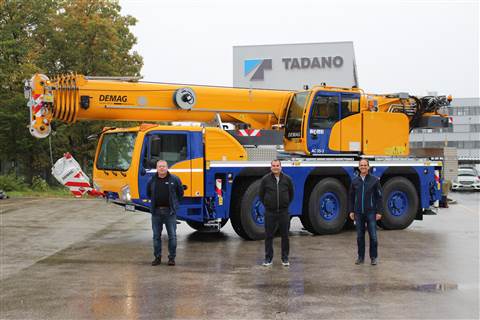 Mikschl Autokrane general manager Roland Mikschl with Tadano Demag's sales managers at the showcase event