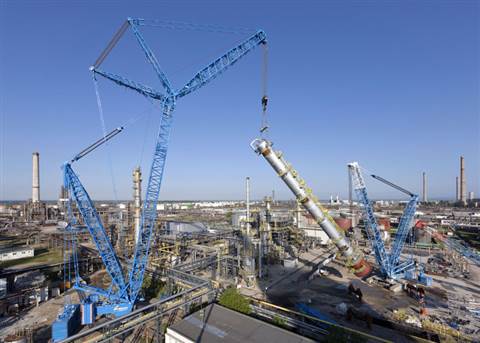 Felbermayr's Liebherr LR 11000 and a LR 1750 crawler cranes work in tandem to lift the column